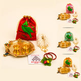 Red satin drawstring potli bag with green parrot design included in Varalakshmi Vratham gift hamper for women