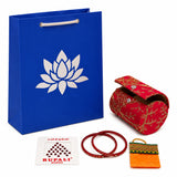 Red embroidered cylindrical bangle box in varalakshmi vratham gift hamper for pooja and housewarming gifts