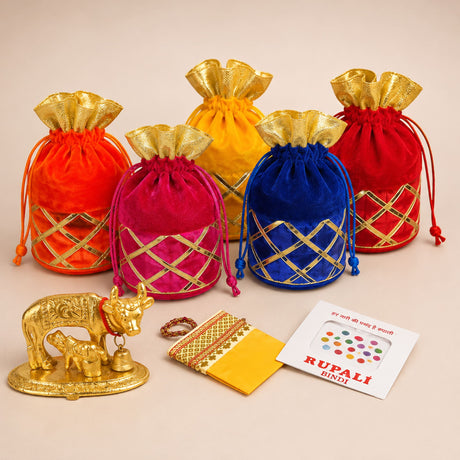Vibrant velvet drawstring potli bags in orange pink yellow and blue with gold lattice for Varalakshmi Vratham gift hamper