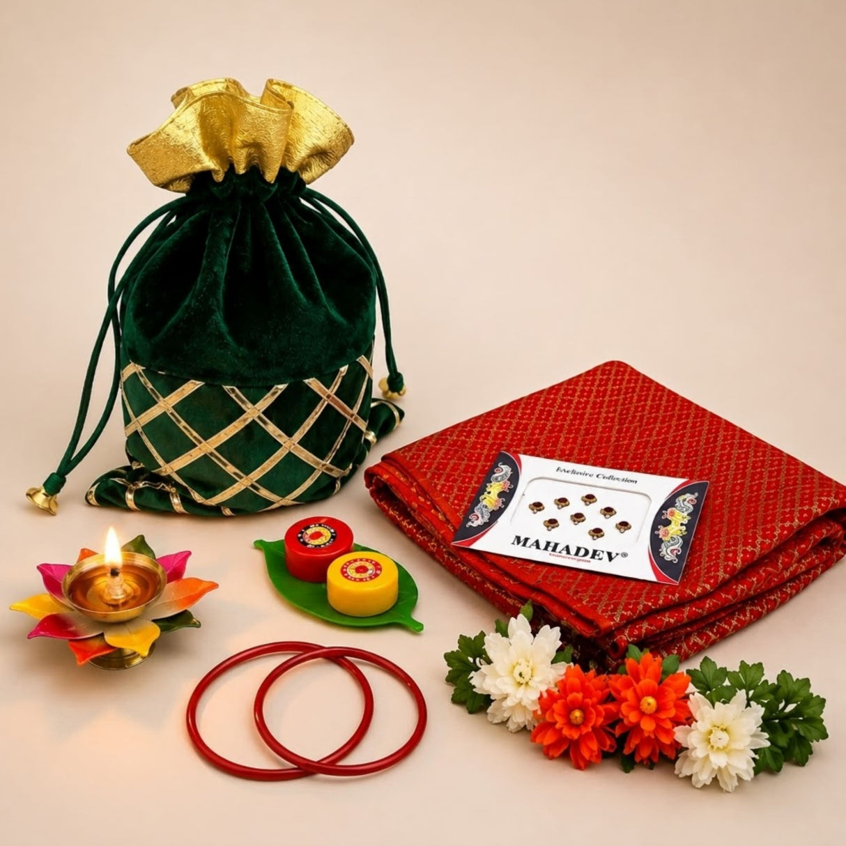 Emerald green velvet potli bag with gold lattice pattern and drawstring top for varalakshmi vratham gift hamper