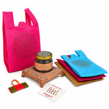 Vibrant pink non-woven fabric tote bag with black mandala design in varalakshmi vratham gift hamper for pooja and navratri