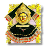 Golden Hindu Goddess statue with green velvet dress for Vara Lakshmi Navaratri pooja