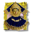 Golden Hindu deity wall hanging featuring Goddess Varalaxmi adorned with jewelry and velvet dress for religious ceremonies