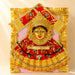 Varalaxmi goddess face set with vibrant red and gold embroidery green floral accents and fringed border for pooja rituals