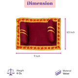 Pack of 2 velvet pooja aasan and pillow set in rich maroon with gold trim and red swastika border for laddu gopal rituals