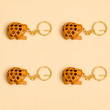 Set of 4 wooden hedgehog keychains with honeycomb pattern and gold metal rings for good luck and gift use
