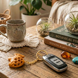 Orange carved wooden fish keychain with gold chain attached to car key fob from 4pc thanksgiving amulet set