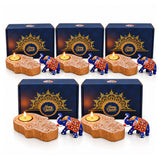 Blue and orange decorative elephant figurines with intricate patterns in a diwali gift hamper with wooden tea light holder