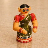 Hand-painted wooden Kondapalli bride figurine in vibrant red green and yellow for traditional Golu decor and gifting