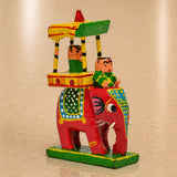 Vibrant red wooden Kondapalli Maharaja Ambari elephant handpainted with yellow green carriage and miniature figures for home decor