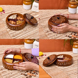 Handcrafted round wooden indian spice box organizer with rich brown finish, white inlay patterns, and black knob closure