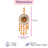 A 16-inch tall orange and gold woollen stuffed rajasthani dreamcatcher with beads and bell charms for home decor