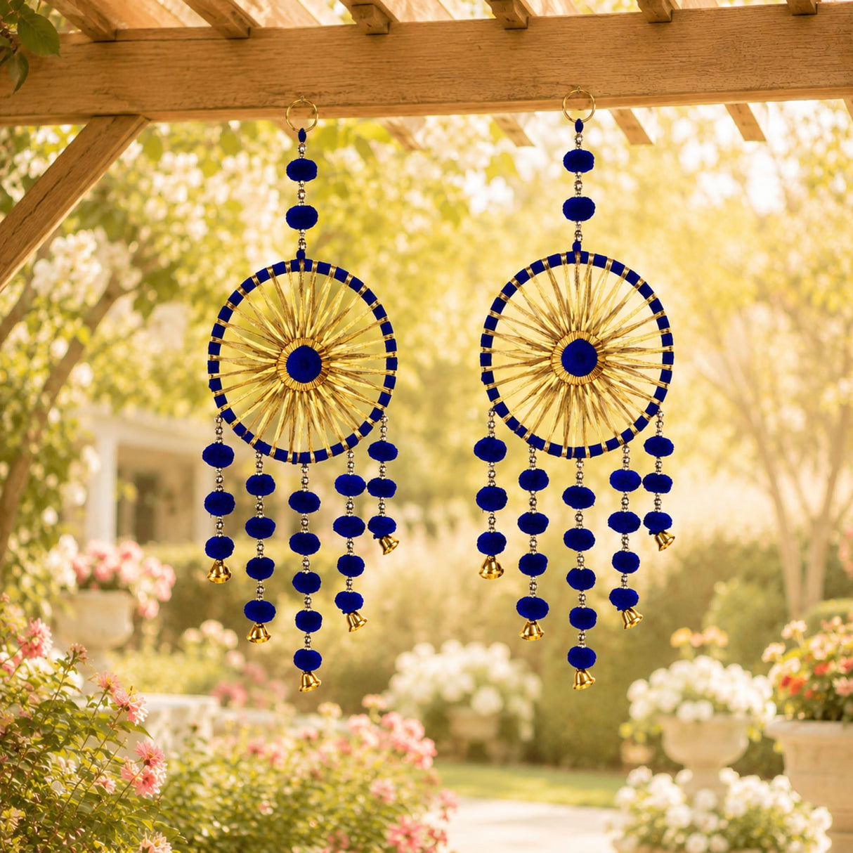 Blue and gold woollen stuffed traditional rajasthani dreamcatcher wind chimes hanging from wooden pergola decorative showpiece