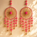 Pink and gold woollen stuffed rajasthani dreamcatcher ring wall hanging with pom-poms and bells for home decor